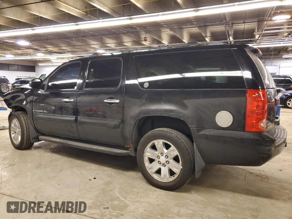 2007 GMC Yukon XL SLT z VIN 1GKFK16377J349144, wystawiony jako Copart lot #84300374 z przebiegiem Nie podano mil oraz Szkoda całkowita • Salvage title. Historia ofert i sprzedaży dostępna na DreamBid. Obrazek 2.