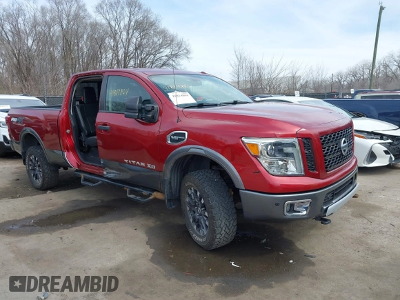 2016 Nissan Titan XD S with VIN 1N6AA1F43GN510841, listed as a IAAI auction lot 41814864 with 163,025 mi miles. Bid and sale history available at carsss.com. Image 1.