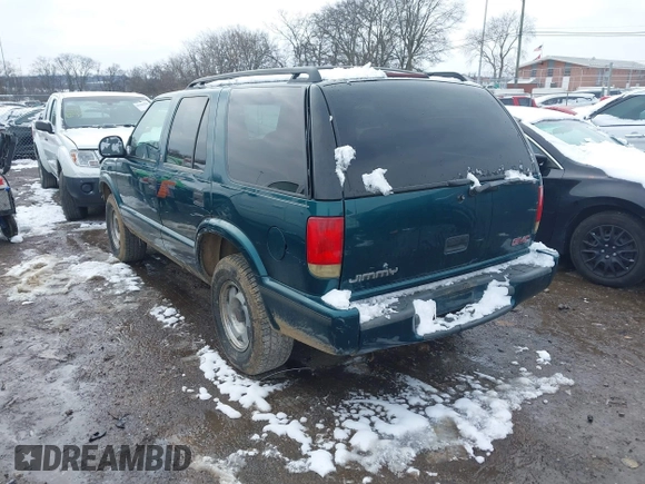 1998 GMC Jimmy SL with VIN 1GKCS13W4W2562613, listed as a IAAI auction lot 41610601 with 1 mi miles. Bid and sale history available at carsss.com. Image 3.