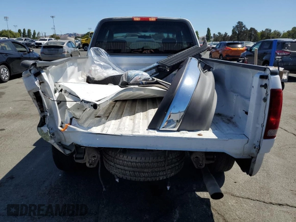 2002 Ford F-150 XL with VIN 1FTRX17212NA28461, listed as a Copart auction lot 63710665 with 185,460 mi miles and Salvage title. Bid and sale history available at DreamBid. Image 6.