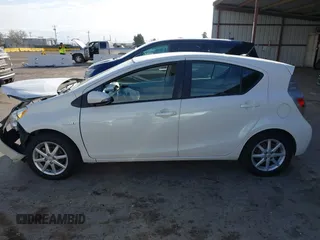 2012 Toyota Prius c One with VIN JTDKDTB38C1514005, listed as a IAAI auction lot 41903868 with 62,344 mi miles. Bid and sale history available at carsss.com. Image 15.