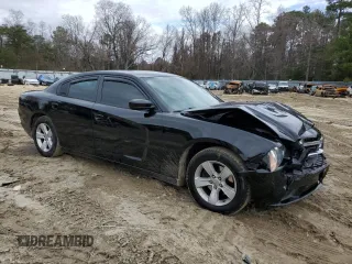 2013 Dodge Charger SE z VIN 2C3CDXBG3DH566891, wystawiony jako Copart lot #50501075 z przebiegiem 176 024 mil mil oraz Szkody całkowita. Historia ofert i sprzedaży dostępna na DreamBid. Obrazek 4.