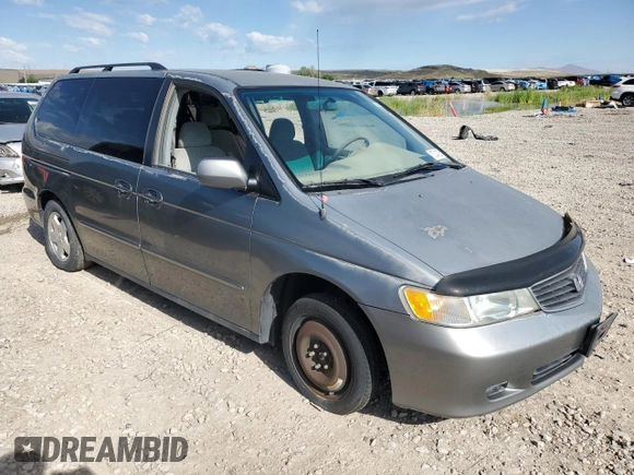 2001 Honda Odyssey EX z VIN 2HKRL18691H571178, wystawiony jako Copart lot #57343205 z przebiegiem 198 506 mil mil oraz Czysty tytuł • Clean title. Historia ofert i sprzedaży dostępna na DreamBid. Obrazek 4.