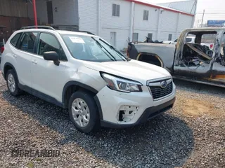 2020 Subaru Forester with VIN JF2SKADC2LH573843, listed as a IAAI auction lot 41870710 with 70,373 mi miles. Bid and sale history available at carsss.com. Image 1.