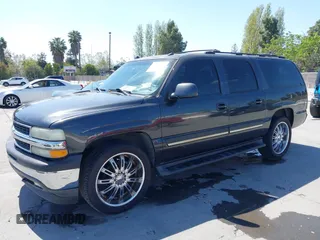 2005 Chevrolet Suburban Z71 with VIN 3GNFK16Z35G126718, listed as a IAAI auction lot 42084280 with 237,875 mi miles. Bid and sale history available at carsss.com. Image 2.