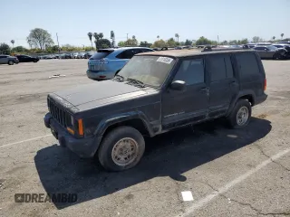 1999 Jeep Cherokee Sport z VIN 1J4FT68S0XL555883, wystawiony jako Copart lot #51016255 z przebiegiem 128 306 mil mil oraz Szkoda całkowita • Salvage title. Historia ofert i sprzedaży dostępna na DreamBid. Obrazek 1.