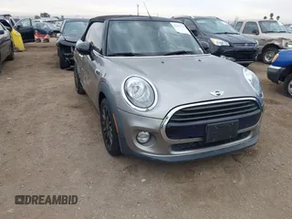 2016 MINI Convertible with VIN WMWWG5C51G3A81075, listed as a IAAI auction lot 41681717 with 54,956 mi miles and . Bid and sale history available at DreamBid. Image 1.