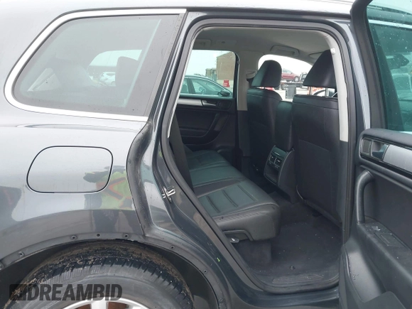 2012 Volkswagen Touareg Sport with VIN WVGEF9BP9CD008545, listed as a IAAI auction lot 41492653 with 138,424 mi miles and . Bid and sale history available at DreamBid. Image 8.