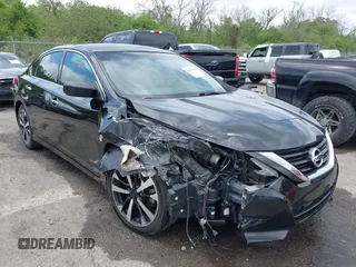 2018 Nissan Altima SR with VIN 1N4AL3AP5JC135313, listed as a IAAI auction lot 41964455 with 86,042 mi miles and . Bid and sale history available at carsss.com. Image 1.