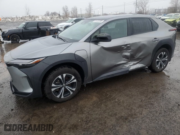 2023 Toyota bZ4X XLE with VIN JTMABACA8PA040484, listed as a Copart auction lot 51410705 with 9,807 mi miles and Salvage Title. Bid and sale history available at DreamBid. Image 1.