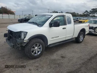 2012 Nissan Titan SE z VIN 1N6AA0CC6CN305465, wystawiony jako Copart lot #83682974 z przebiegiem 198 297 mil mil oraz Szkoda całkowita • Salvage title. Historia ofert i sprzedaży dostępna na DreamBid. Obrazek 1.