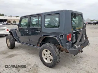 2008 Jeep Wrangler Unlimited Rubicon z VIN 1J4GA69128L529271, wystawiony jako Copart lot #58939945 z przebiegiem 94 503 mil mil oraz Szkoda całkowita • Salvage title. Historia ofert i sprzedaży dostępna na DreamBid. Obrazek 2.