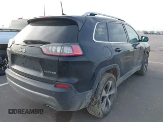 2019 Jeep Cherokee Limited with VIN 1C4PJMDXXKD245877, listed as a IAAI auction lot 41984332 with 103,300 mi miles and . Bid and sale history available at carsss.com. Image 4.