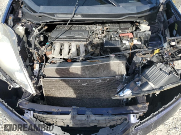 2009 Honda Fit Sport z VIN JHMGE88409S052668, wystawiony jako Copart lot #56142275 z przebiegiem 118 445 mil mil oraz Szkoda całkowita • Salvage title. Historia ofert i sprzedaży dostępna na DreamBid. Obrazek 11.