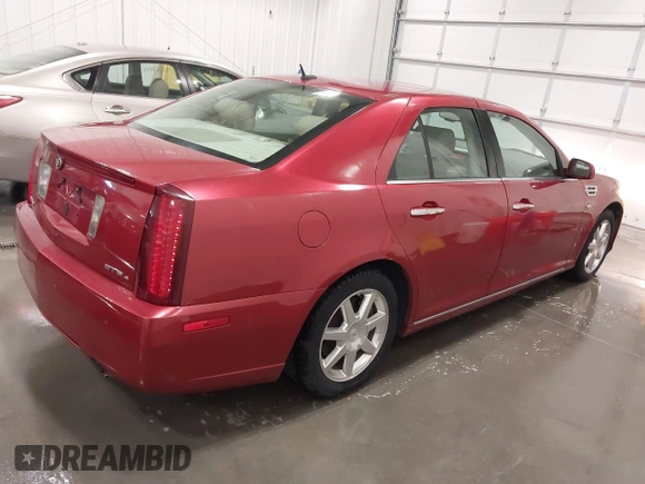 2008 Cadillac STS RWD z VIN 1G6DW67VX80125610, wystawiony jako IAAI lot #42280815 z przebiegiem 207 192 mil mil oraz . Historia ofert i sprzedaży dostępna na DreamBid. Obrazek 4.