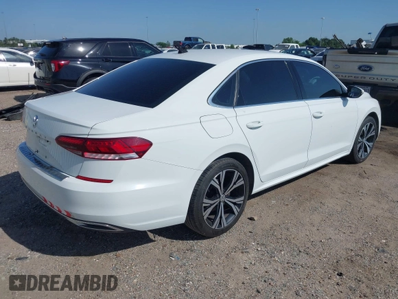 2021 Volkswagen Passat SE with VIN 1VWSA7A30MC000802, listed as a IAAI auction lot 42007087 with 190,171 mi miles and . Bid and sale history available at DreamBid. Image 4.