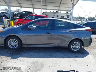 2022 Toyota Prius L Eco with VIN JTDKAMFU2N3172026, listed as a IAAI auction lot 41841090 with 49,011 mi miles. Bid and sale history available at carsss.com. Image 13.
