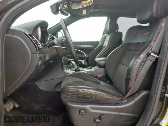 2019 Jeep Grand Cherokee Trailhawk with VIN 1C4RJFLG8KC613582, listed as a Copart auction lot 62901405 with 136,809 mi miles and Salvage title. Bid and sale history available at DreamBid. Image 7.