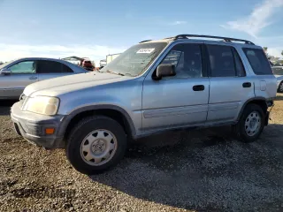 2000 Honda CR-V LX with VIN JHLRD1741YC030308, listed as a Copart auction lot 84634014 with 254,772 mi miles and Salvage Title. Bid and sale history available at carsss.com. Image 1.
