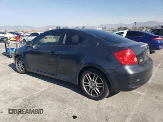 2006 Scion tC z VIN JTKDE177760134694, wystawiony jako Copart lot #43653465 z przebiegiem 245 961 mil mil oraz Szkoda całkowita • Salvage title. Historia ofert i sprzedaży dostępna na DreamBid. Obrazek 2.