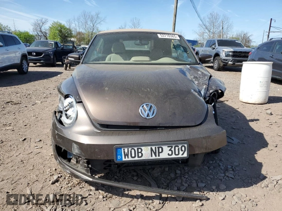 2014 Volkswagen Beetle 2.0L TDI с VIN 3VW6L7ATXEM809087, выставлен на аукционе Copart как лот 53710365 с пробегом Не указан миль и Списание • Salvage title. История ставок и продаж доступна на DreamBid. Изображение 5.
