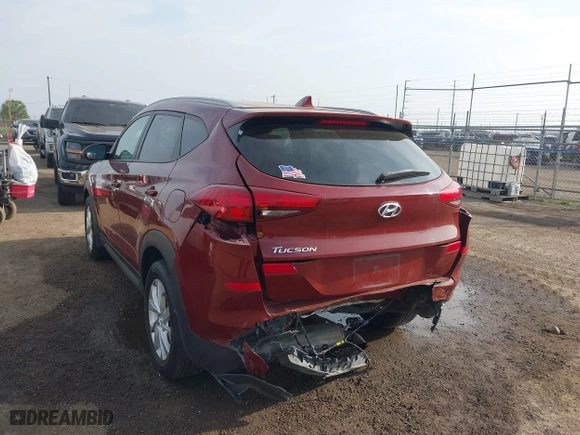 2019 Hyundai Tucson Value with VIN KM8J33A42KU861329, listed as a IAAI auction lot 41679185 with 65,304 mi miles. Bid and sale history available at carsss.com. Image 6.