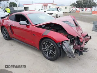 2020 Ford Mustang EcoBoost with VIN 1FA6P8TH4L5189982, listed as a IAAI auction lot 42065871 with 67,942 mi miles. Bid and sale history available at carsss.com. Image 1.