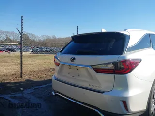 2019 Lexus RX 350L Premium with VIN JTJDZKCA0K2019725, listed as a IAAI auction lot 41303759 with 89,848 mi miles and . Bid and sale history available at DreamBid. Image 16.
