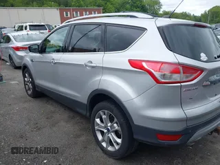 2015 Ford Escape Titanium z VIN 1FMCU9J91FUA85771, wystawiony jako IAAI lot #42306986 z przebiegiem 135 787 mil mil oraz . Historia ofert i sprzedaży dostępna na DreamBid. Obrazek 14.