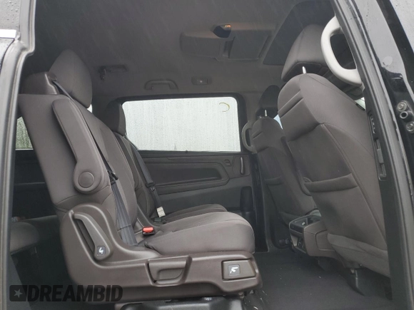 2018 Honda Odyssey z VIN 5FNRL6H40JB503183, wystawiony jako Copart lot #58013285 z przebiegiem 96 805 mil mil oraz Szkoda całkowita • Salvage title. Historia ofert i sprzedaży dostępna na DreamBid. Obrazek 11.