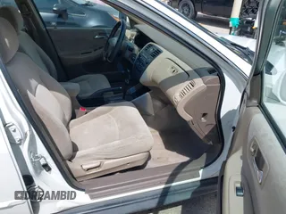 2002 Honda Accord LX z VIN 1HGCG56482A067556, wystawiony jako IAAI lot #42494292 z przebiegiem 209 511 mil mil oraz . Historia ofert i sprzedaży dostępna na DreamBid. Obrazek 5.