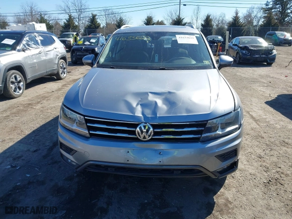 2020 Volkswagen Tiguan SE with VIN 3VV2B7AX0LM141970, listed as a IAAI auction lot 41633622 with 64,737 mi miles. Bid and sale history available at carsss.com. Image 12.
