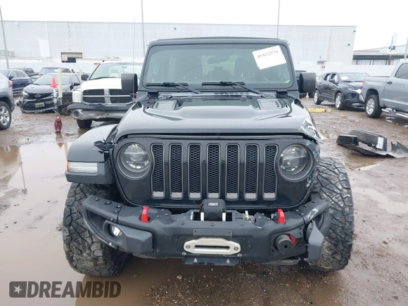 2019 Jeep Wrangler Unlimited Rubicon z VIN 1C4HJXFNXKW511193, wystawiony jako IAAI lot #41452579 z przebiegiem 91 857 mil mil oraz . Historia ofert i sprzedaży dostępna na DreamBid. Obrazek 13.