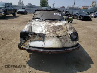 1978 Alfa Romeo Spider z VIN 115410002428, wystawiony jako Copart lot #56698104 z przebiegiem Nie podano mil oraz Szkody całkowita. Historia ofert i sprzedaży dostępna na DreamBid. Obrazek 5.