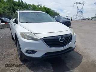 2014 Mazda CX-9 Grand Touring z VIN JM3TB3DV0E0436649, wystawiony jako IAAI lot #42319638 z przebiegiem 128 421 mil mil oraz . Historia ofert i sprzedaży dostępna na DreamBid. Obrazek 6.