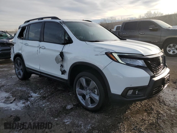 2021 Honda Passport Touring with VIN 5FNYF8H96MB005648, listed as a Copart auction lot 87242864 with 40,770 mi miles and Salvage Title. Bid and sale history available at carsss.com. Image 4.