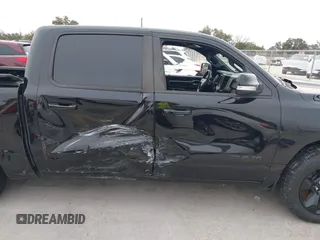 2019 Ram 1500 Big Horn z VIN 1C6RREFT1KN891182, wystawiony jako IAAI lot #41634042 z przebiegiem 128 972 mil mil oraz . Historia ofert i sprzedaży dostępna na DreamBid. Obrazek 13.