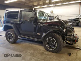 2013 Jeep Wrangler Rubicon with VIN 1C4HJWCG6DL666540, listed as a Copart auction lot 79337404 with 130,448 mi miles and Salvage title. Bid and sale history available at DreamBid. Image 4.