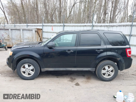 2009 Ford Escape XLS z VIN 1FMCU02759KA61417, wystawiony jako IAAI lot #42102452 z przebiegiem 207 262 mil mil oraz . Historia ofert i sprzedaży dostępna na DreamBid. Obrazek 14.