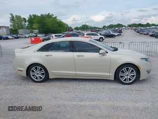 2016 Lincoln MKZ with VIN 3LN6L2J91GR624583, listed as a IAAI auction lot 42113321 with 126,592 mi miles and . Bid and sale history available at DreamBid. Image 13.