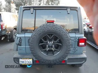 2024 Jeep Wrangler Sport S with VIN 1C4RJXN64RW337985, listed as a IAAI auction lot 41261982 with 1,845 mi miles and . Bid and sale history available at DreamBid. Image 16.