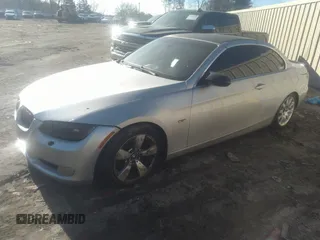 2007 BMW 3 Series 335i with VIN WBAWL73587PX49287, listed as a IAAI auction lot 41454028 with 182,630 mi miles. Bid and sale history available at carsss.com. Image 2.