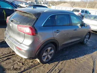 2018 Kia Niro LX with VIN KNDCB3LC9J5157982, listed as a IAAI auction lot 41660700 with 63,023 mi miles. Bid and sale history available at carsss.com. Image 4.
