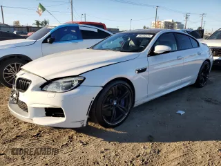 2016 BMW M6 z VIN WBS6E9C59GG437108, wystawiony jako Copart lot #88536225 z przebiegiem 63 891 mil mil oraz Szkody całkowita. Historia ofert i sprzedaży dostępna na DreamBid. Obrazek 1.