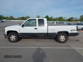 1997 Chevrolet Silverado 1500 with VIN 1GCEK19R5VE232708, listed as a IAAI auction lot 42197468 with 208,458 mi miles and . Bid and sale history available at DreamBid. Image 14.