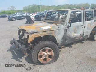 2013 Jeep Wrangler Unlimited Sahara with VIN 1C4BJWEG6DL551696, listed as a IAAI auction lot 42171223 with 164,927 mi miles and . Bid and sale history available at DreamBid. Image 6.