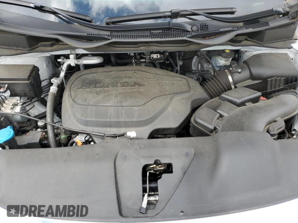 2022 Honda Odyssey Touring with VIN 5FNRL6H8XNB016064, listed as a Copart auction lot 65289595 with 24,946 mi miles and Salvage title. Bid and sale history available at DreamBid. Image 12.
