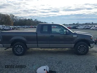 2005 Ford F-150 XLT with VIN 1FTPX12505NB28550, listed as a IAAI auction lot 41381125 with 248,711 mi miles. Bid and sale history available at carsss.com. Image 13.