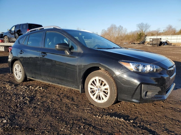 2017 Subaru Impreza Premium with VIN 4S3GTAD67H3727656, listed as a Copart auction lot 50179645 with 152,517 mi miles and Salvage Title. Bid and sale history available at carsss.com. Image 4.