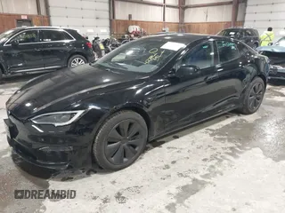 2022 Tesla Model S with VIN 5YJSA1E58NF478403, listed as a IAAI auction lot 41533099 with 42,779 mi miles and . Bid and sale history available at DreamBid. Image 2.